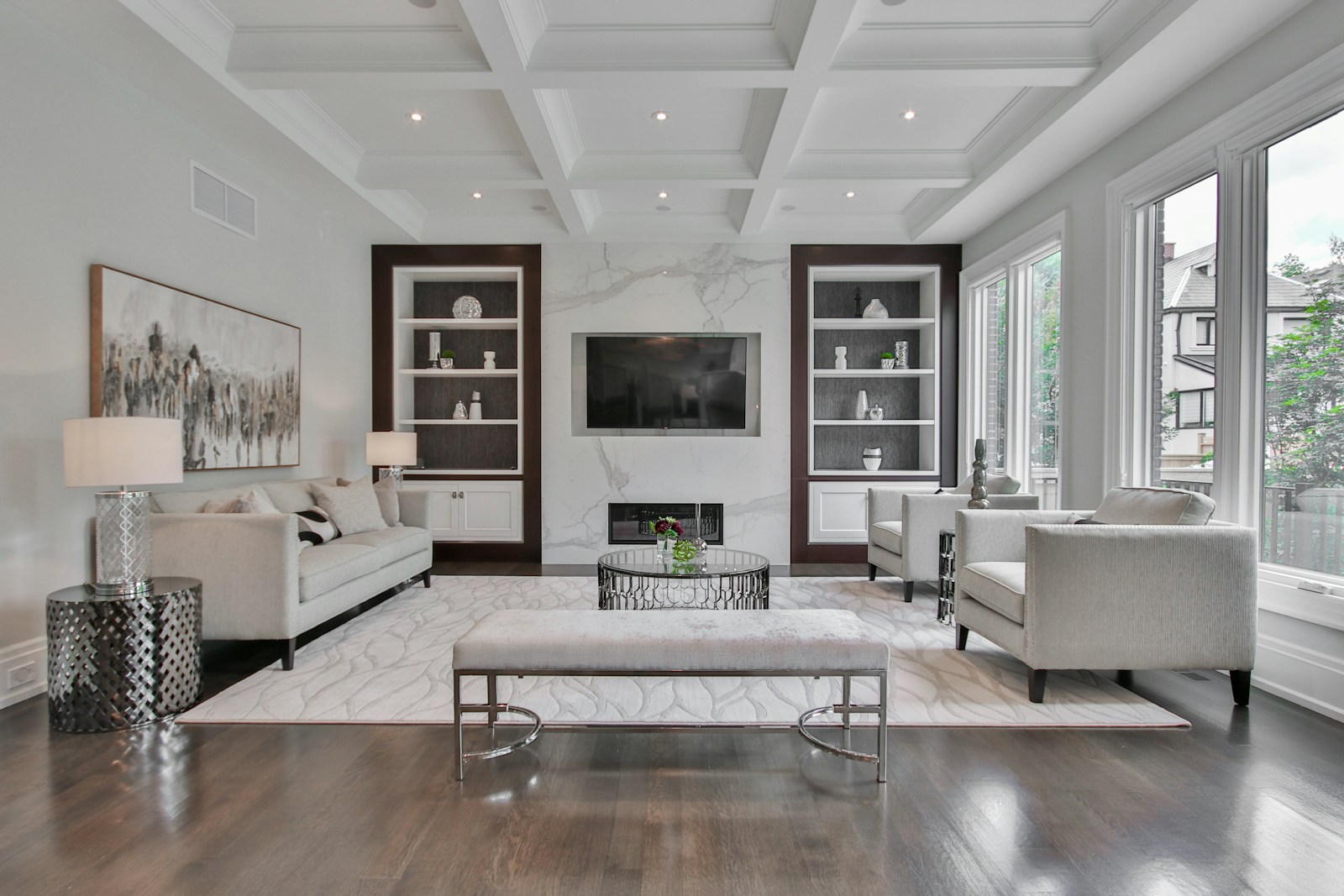 Elegant living room with marble fireplace, illustrative interior photograph
